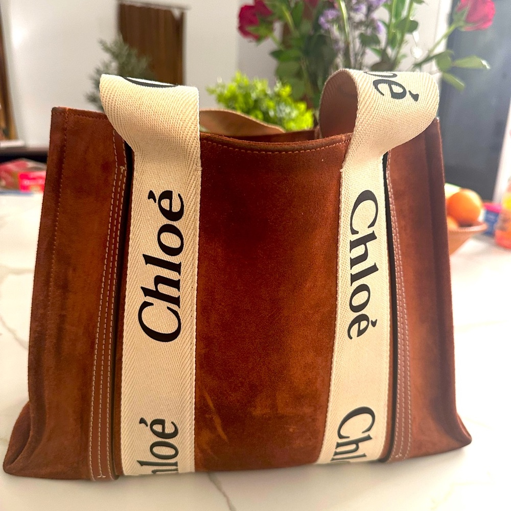 Chloe Suede “woody” tote bag…. Very stylish, soft suede. Some wear on handles.